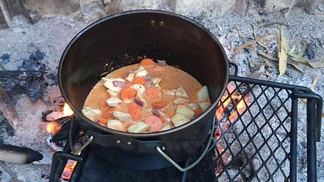 Combining Ingredients In Camp Oven Featured Image