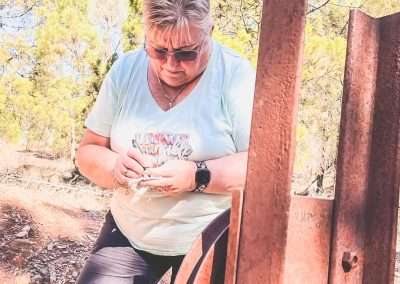 Signing Geocache Logbook