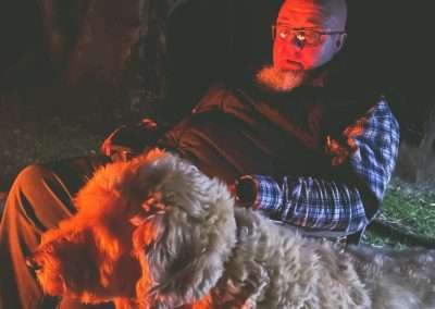 Relaxing By The Camp Fire