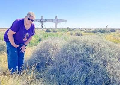 Amanda Finding A Geocache At The Sculpture Park On Oodnadatta Track