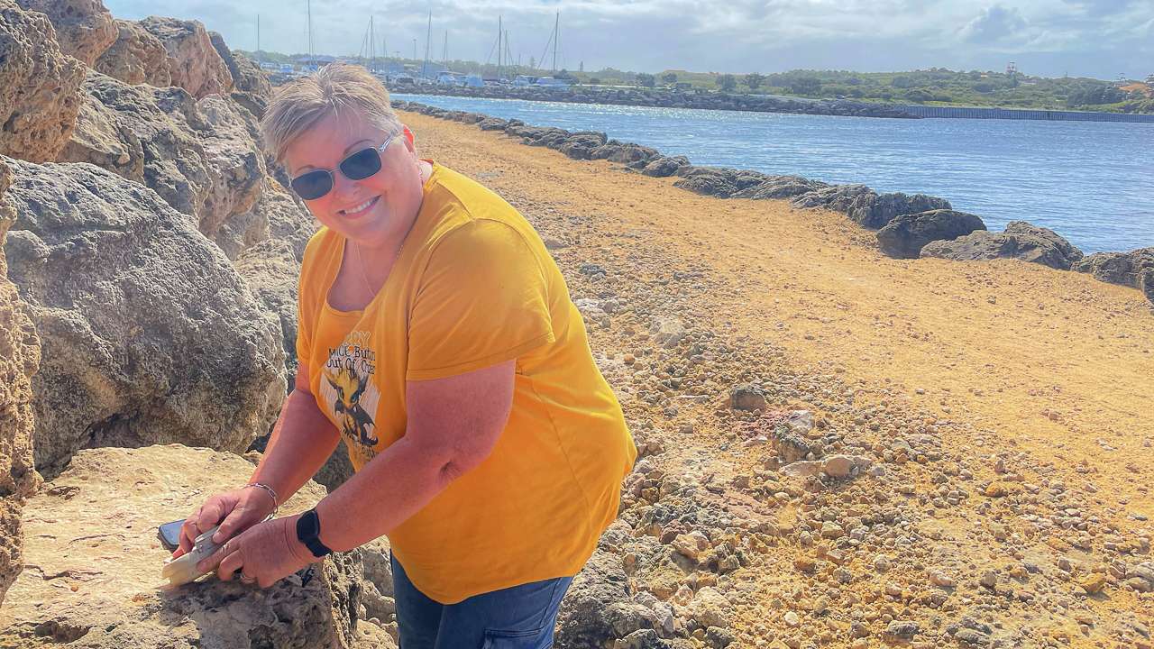 Amanda With A Geocache On The Breakwall At Woodman Point wA