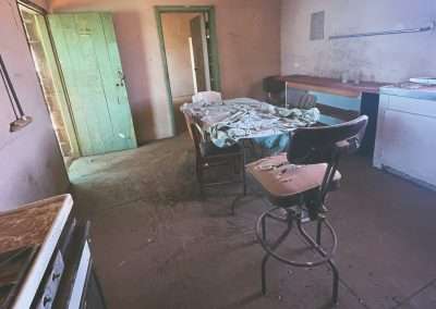 Kitchen Table And Chairs At Abandoned West Mount Hut