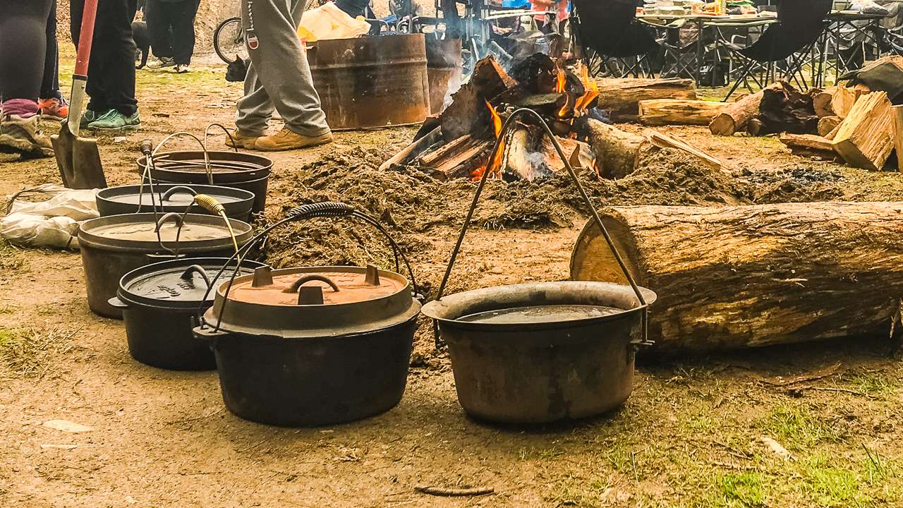 Spun Steel And Cast Iron Camp Ovens Side By Side