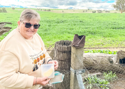 Amanda With A Geocache Found At Langs Creek Cemetery
